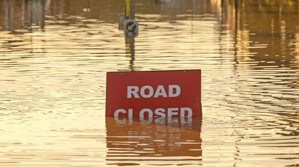 flooded road closed sign