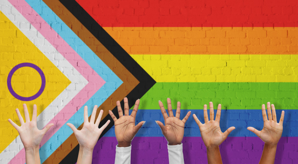 lgbtq human rights concept against rainbow pride flag bckground